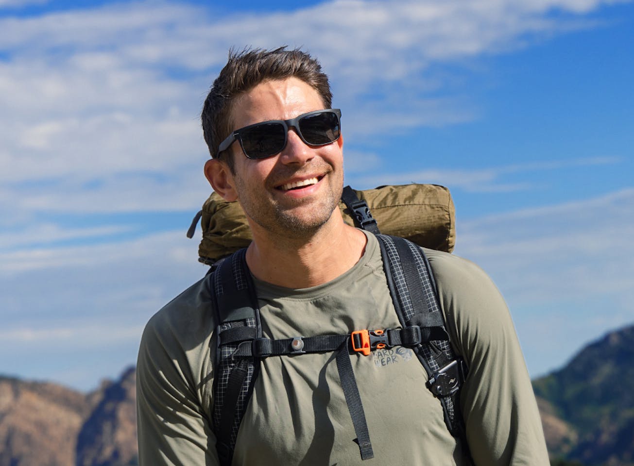 Man hiking in Braker 2.0 sunglasses