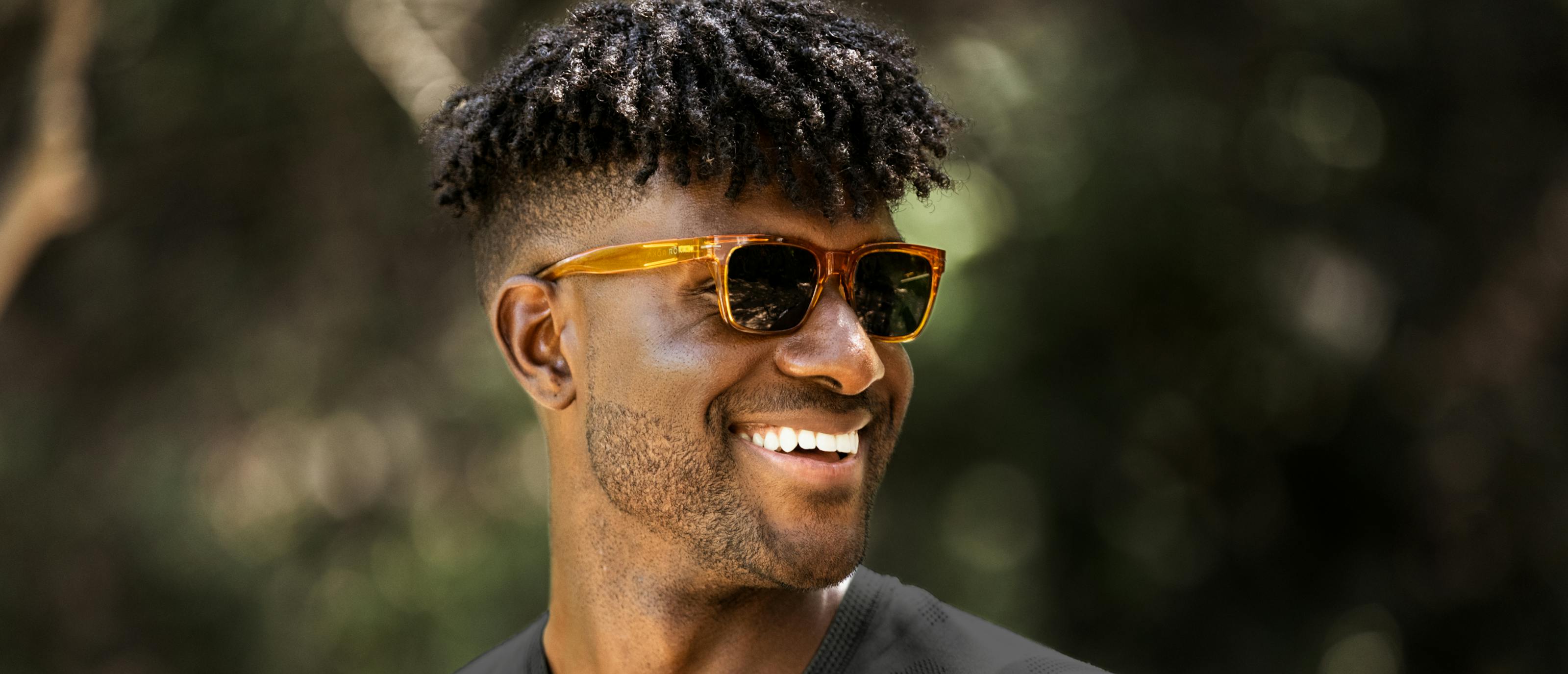 Man smiling in Lochart sunglasses