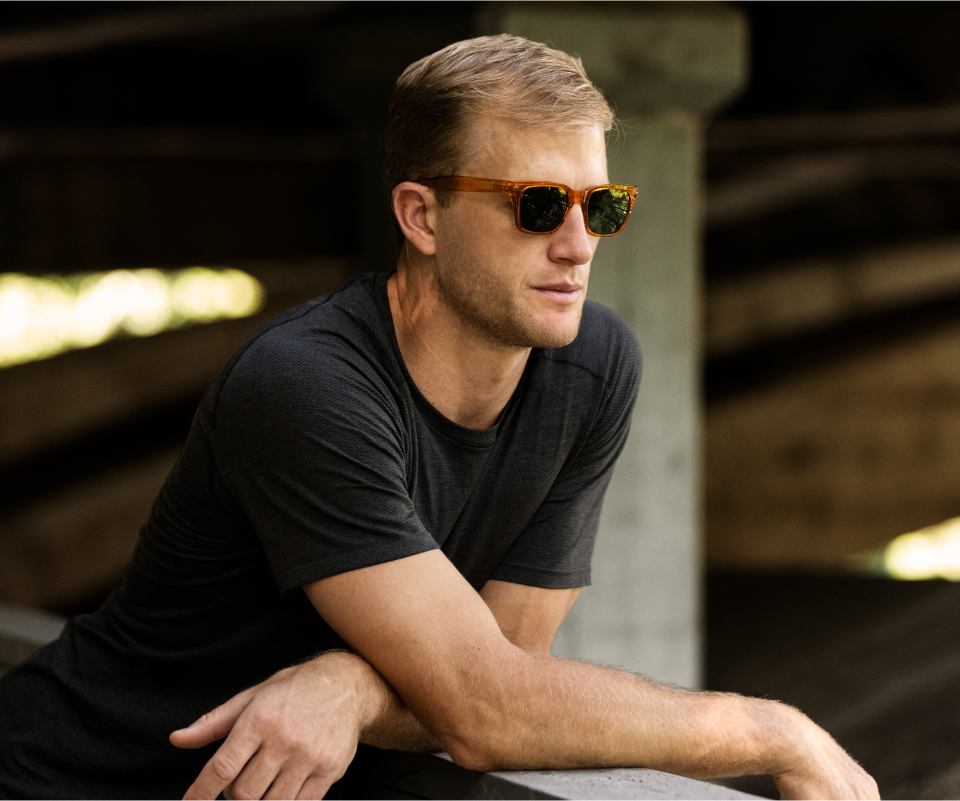 Man in black shirt and Lockhart sunglasses