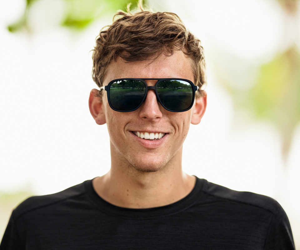 Man smiling outside in Bandera Sunglasses