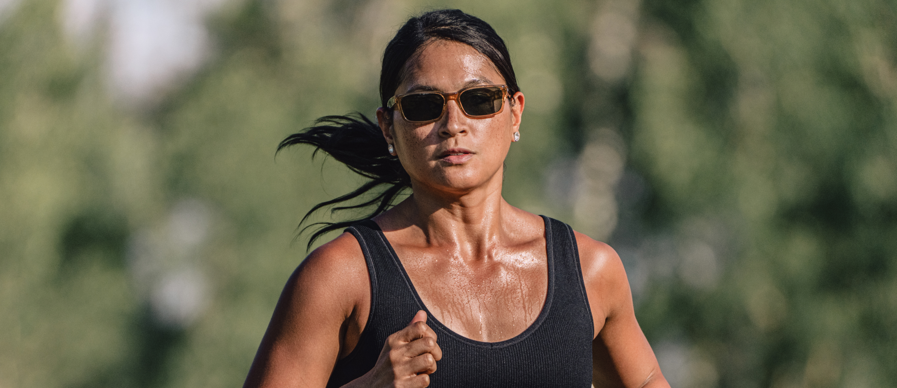 Woman running in Mayfield sunglasses