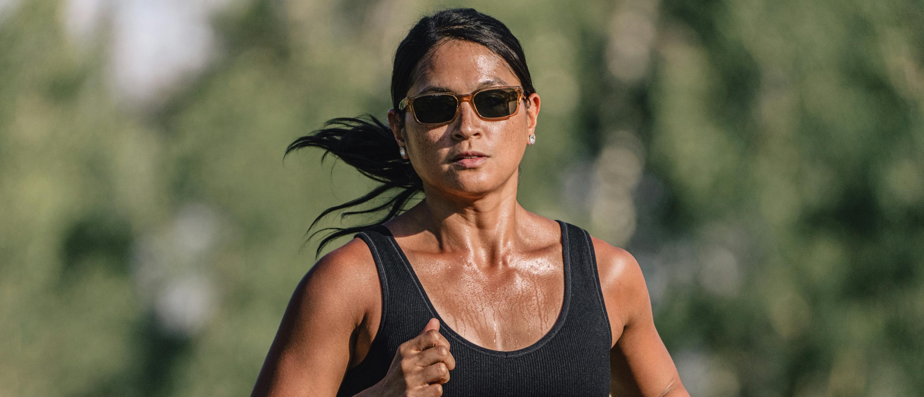 Woman running in Mayfield sunglasses