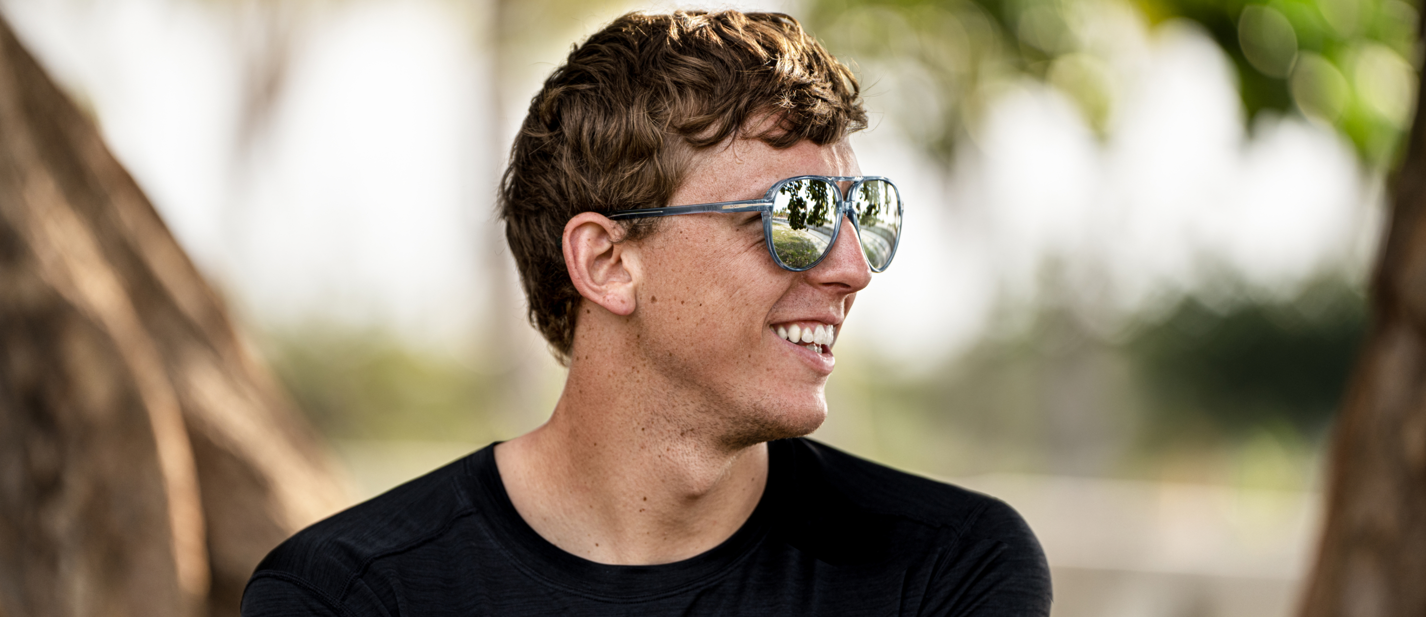 Man wearing black shirt and Havana sunglasses