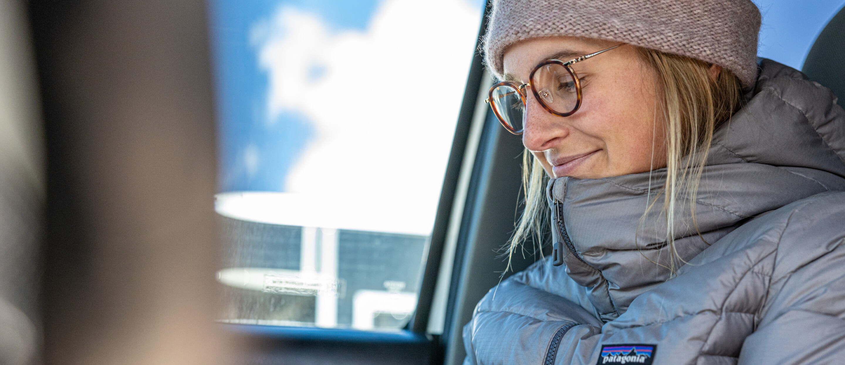Woman wearing beanie and Alto Eyeglasses