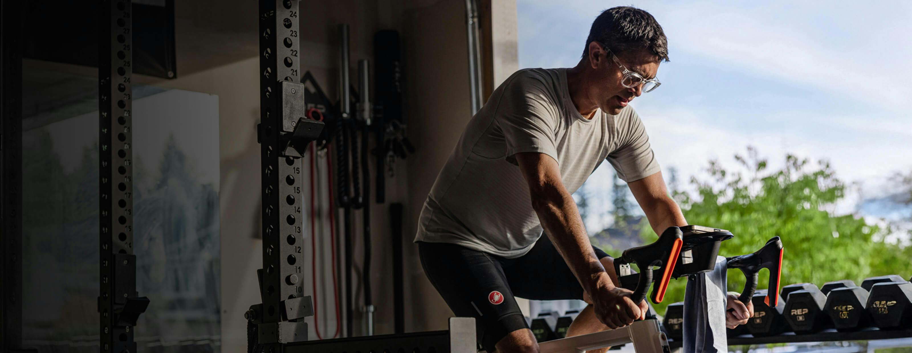 Man riding stationary bike 