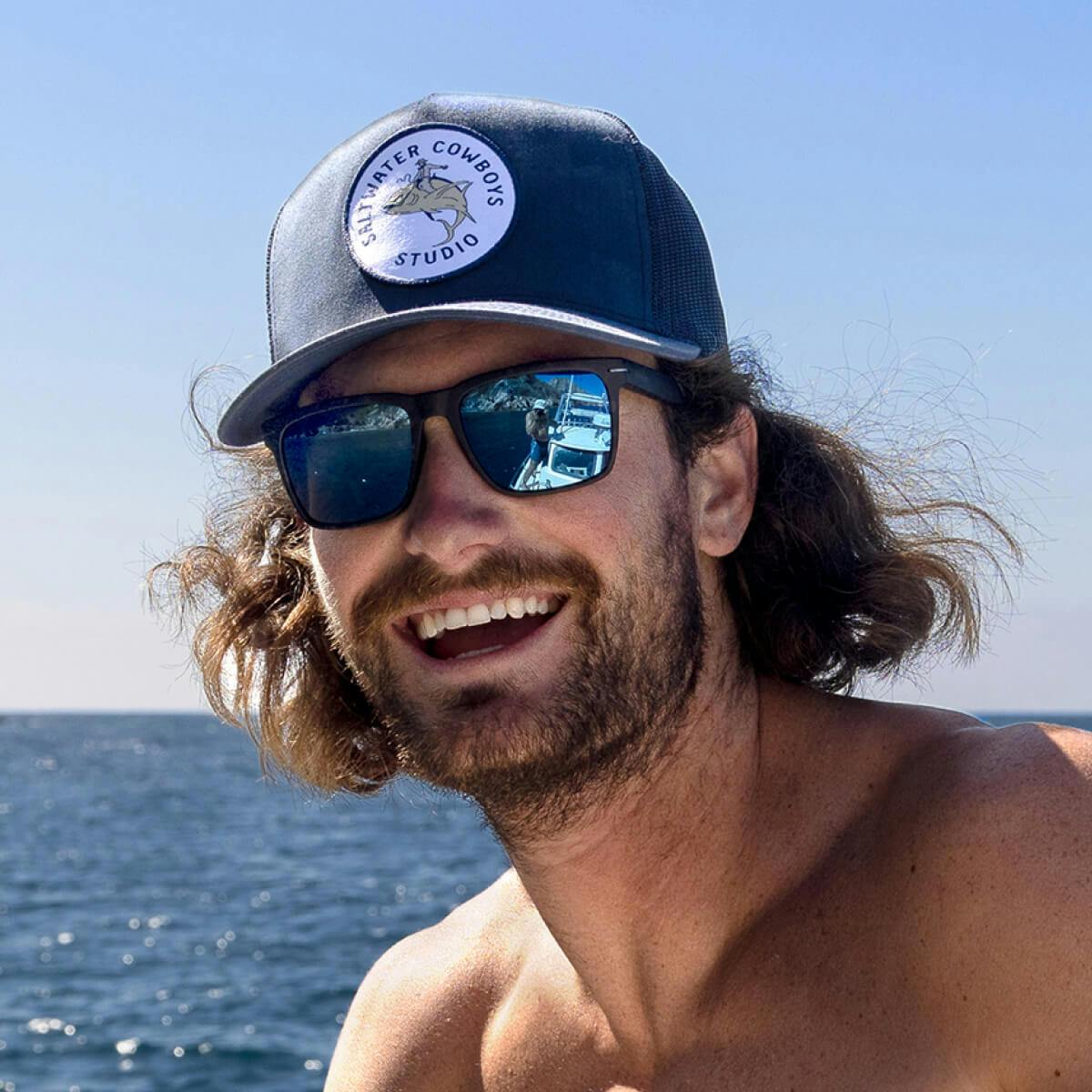 Man at sea wearing Barton sunglasses