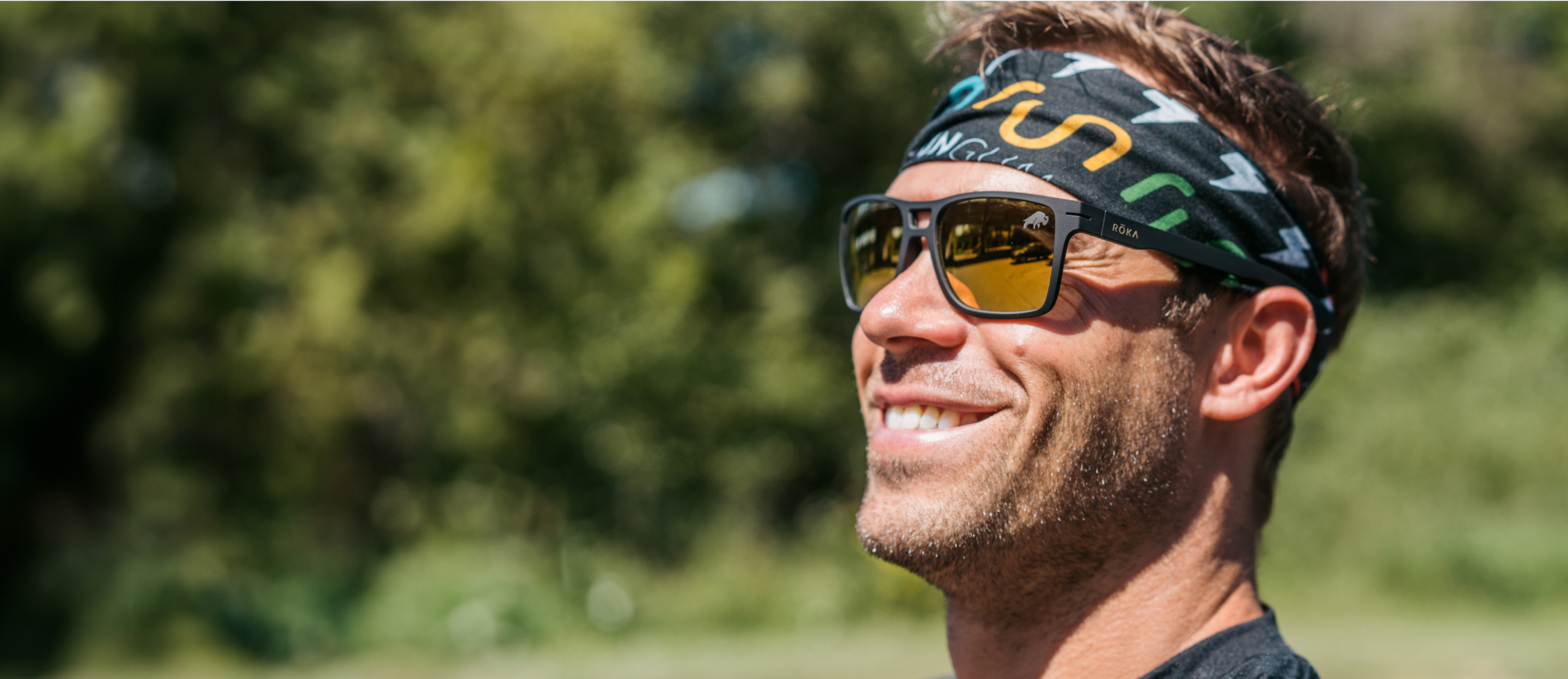 Man wearing headband and ROKA Sunglasses