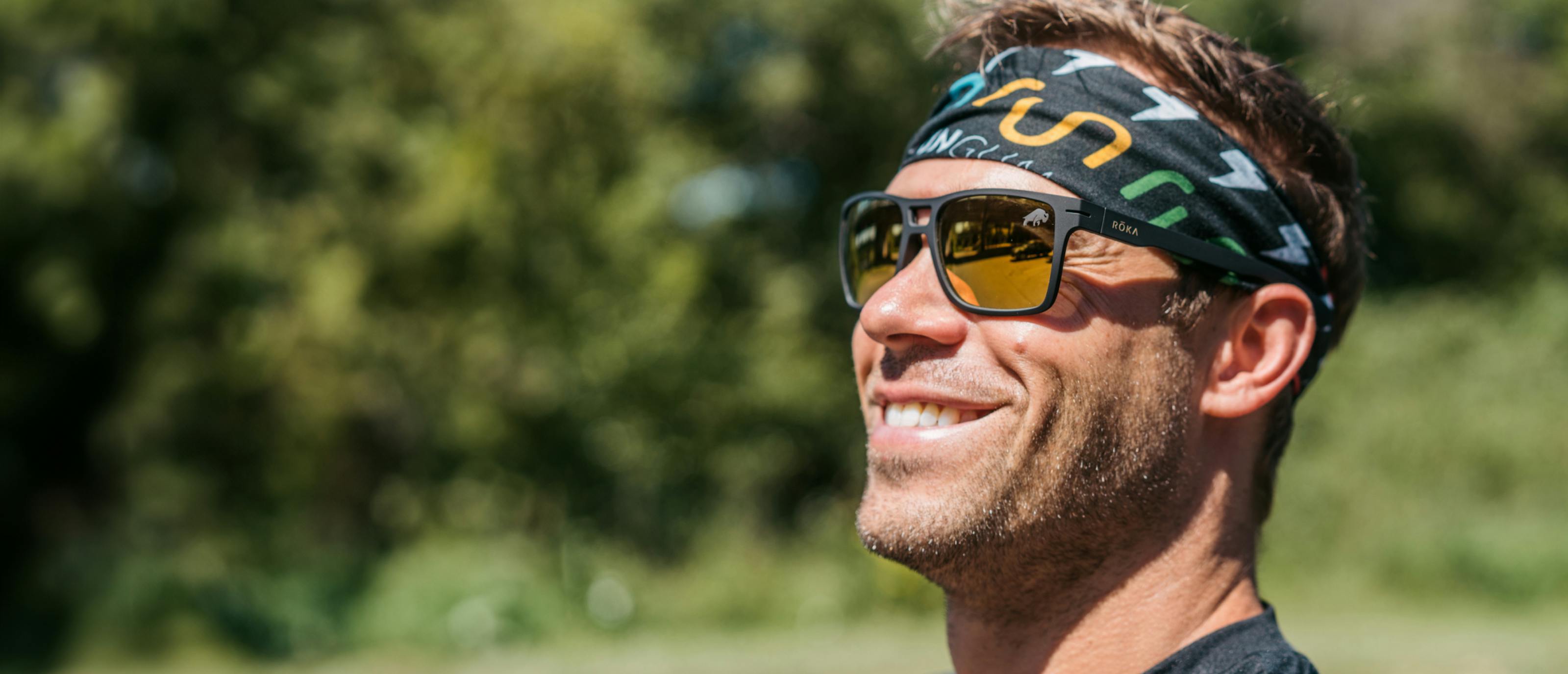 Man wearing headband and ROKA Sunglasses