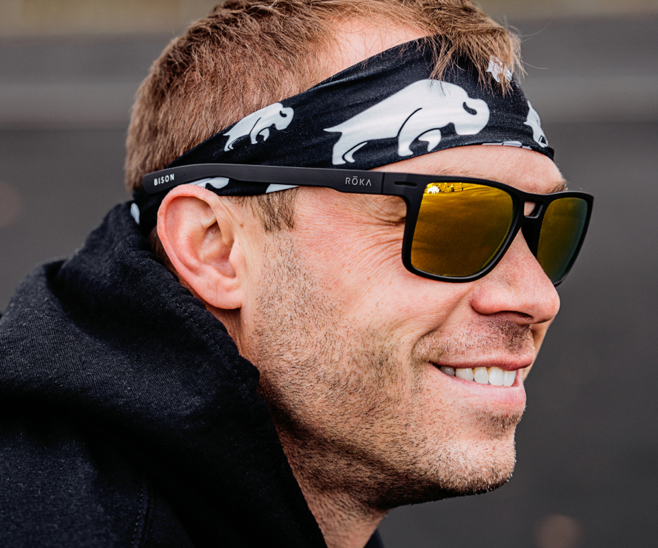 Man wearing headband and ROKA Sunglasses