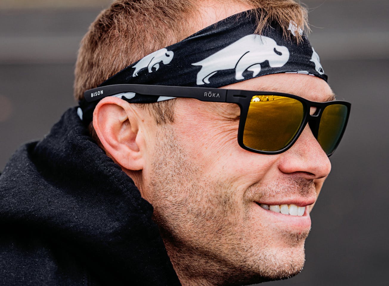 Man wearing headband and ROKA Sunglasses