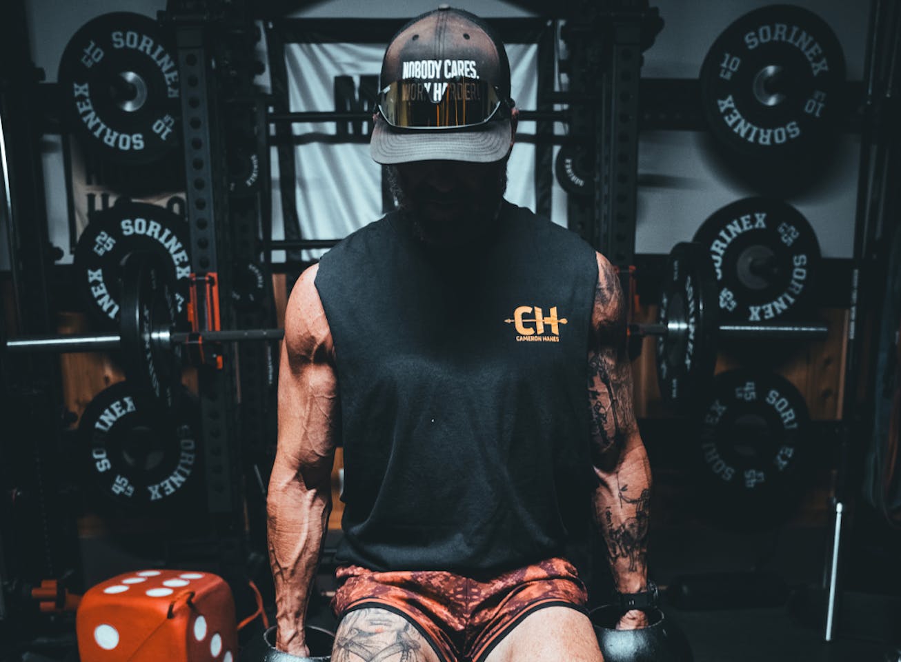 Man doing curls in garage gym