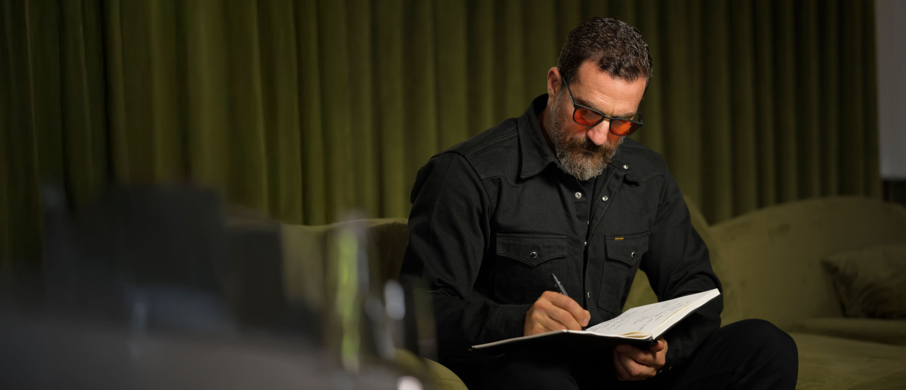 Dr. Andrew Huberman wearing ROKA wind down™ eyewear.