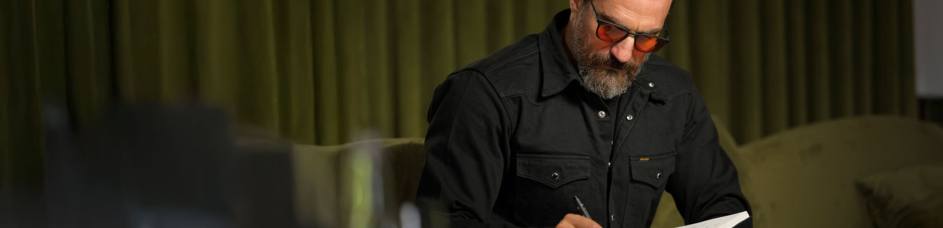 Dr. Andrew Huberman wearing ROKA wind down™ eyewear.