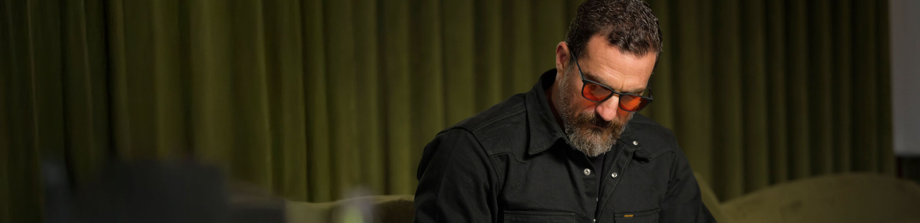 Dr. Andrew Huberman wearing ROKA wind down™ eyewear.