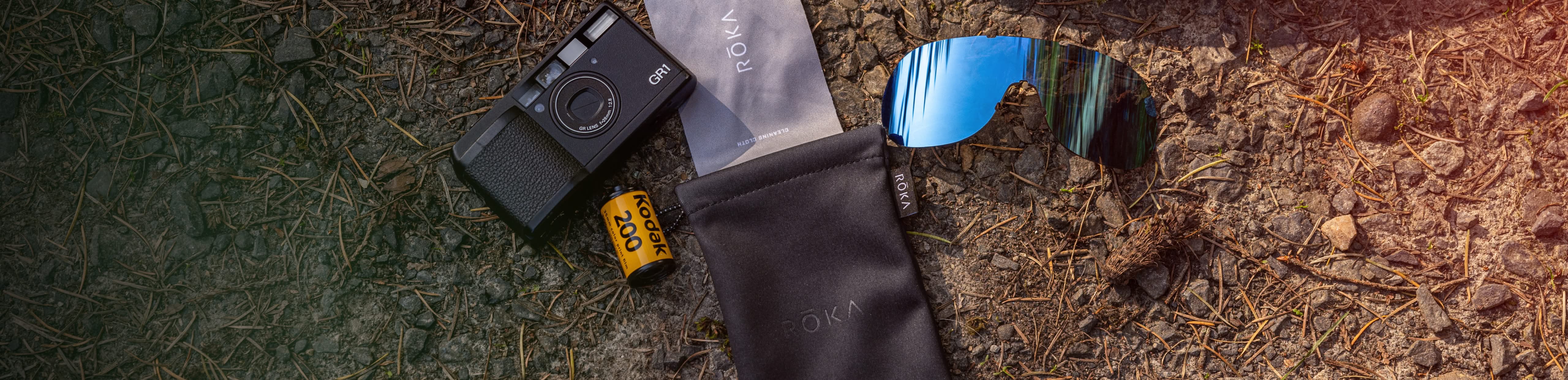 Sunglasses with case and camera