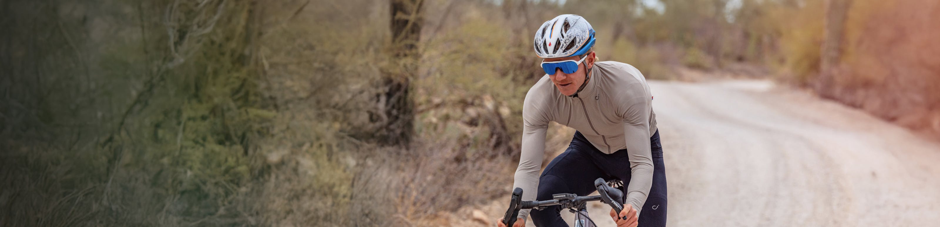 Man cycling wearing San Remo Sunglasses