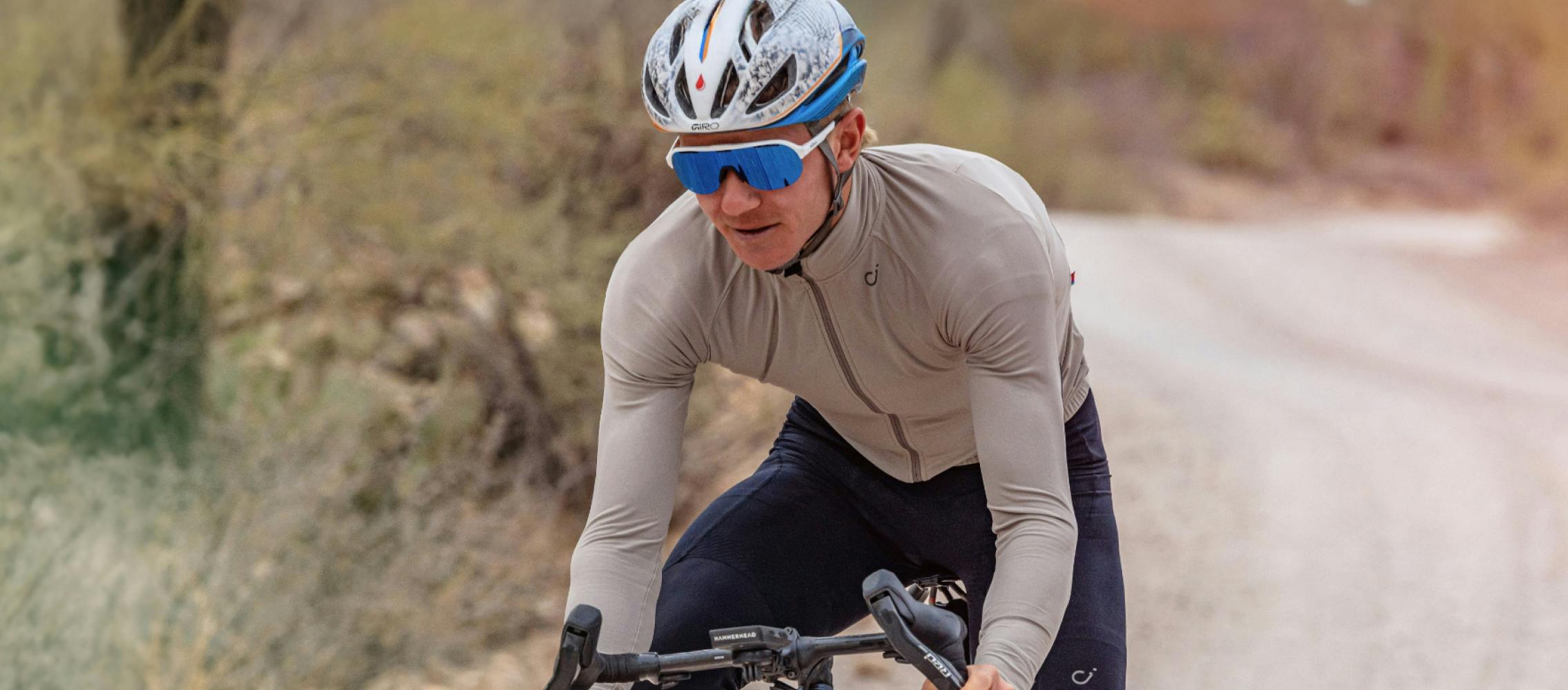 Man cycling in ROKA sunglasses