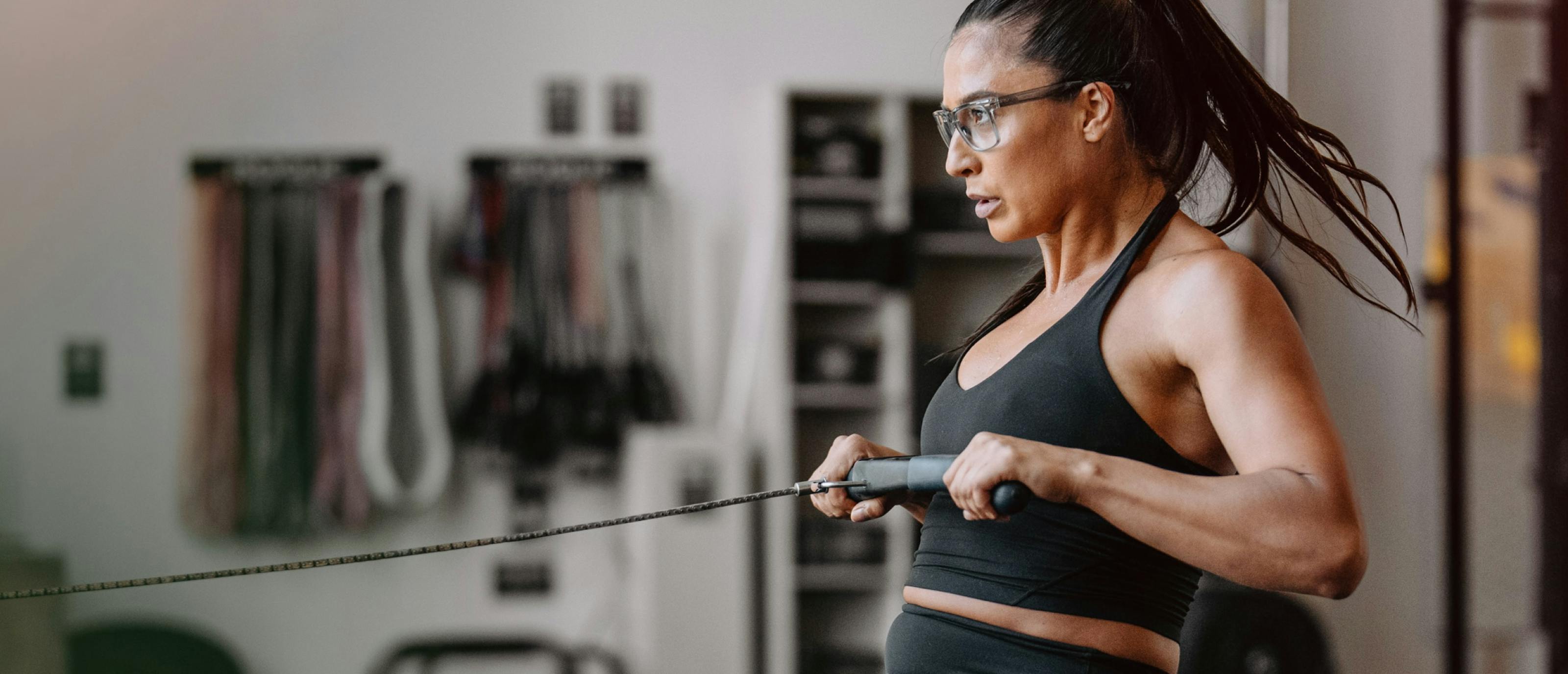 Woman using rowing machine