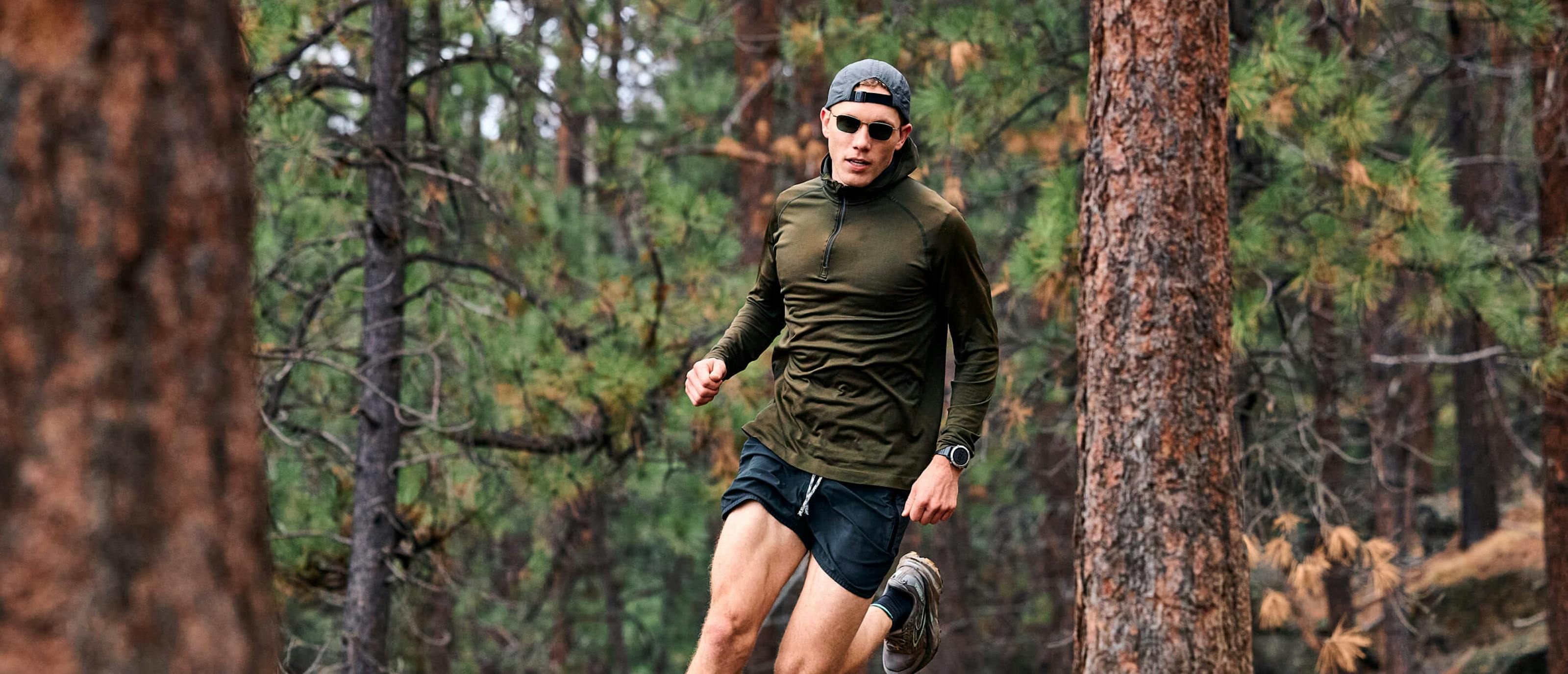Man running in woods wearing Vapor Nano sunglasses