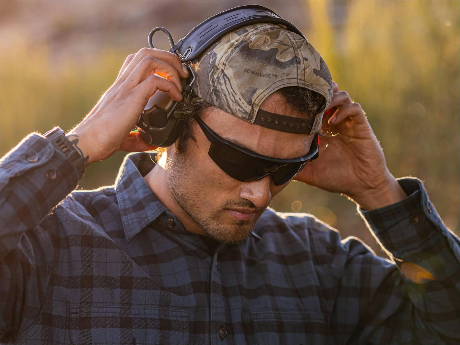Man looking down while wearing SR-1EP Sunglasses