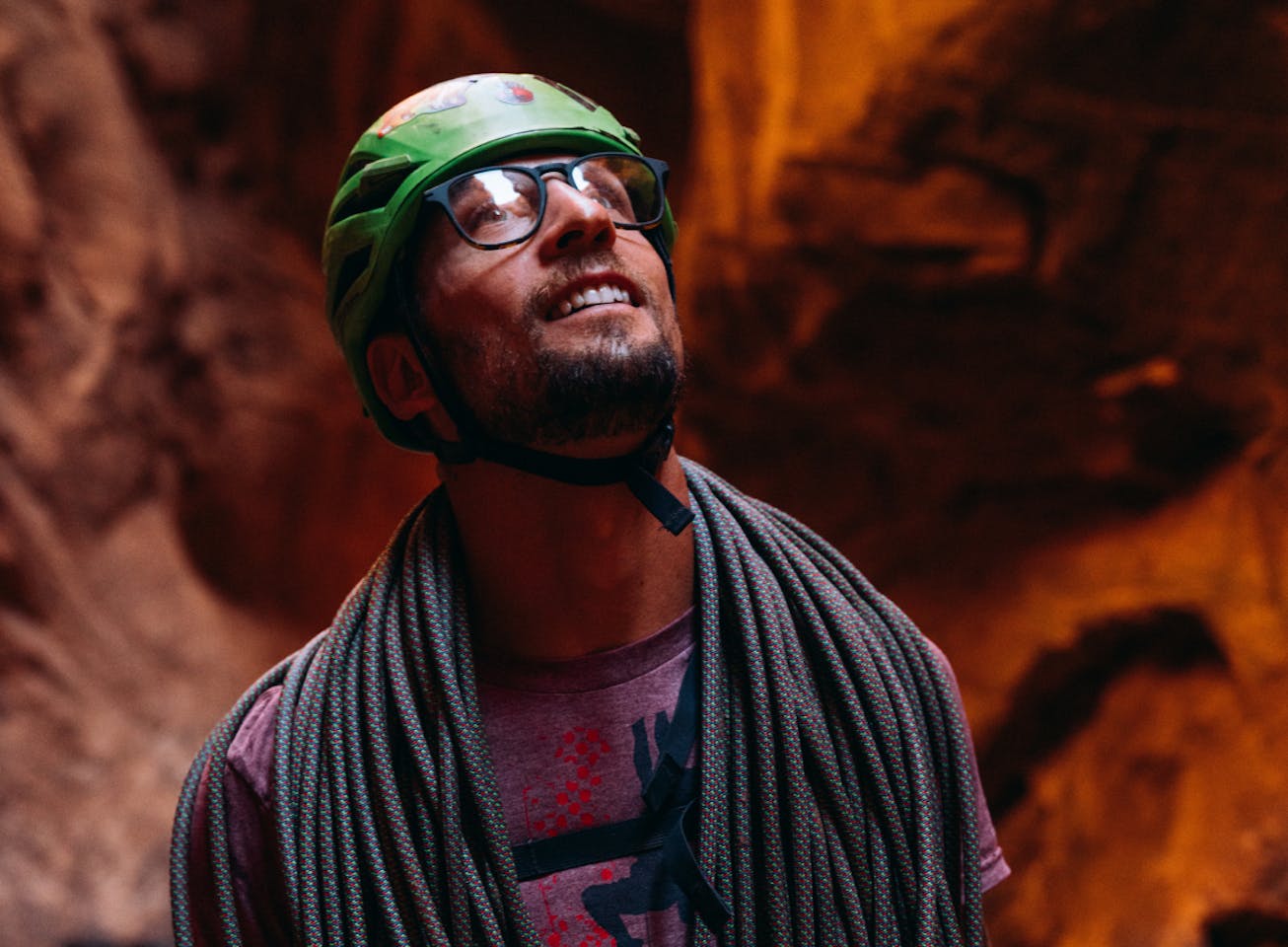Man rock climbing wearing square, matte black Hunter eyeglasses