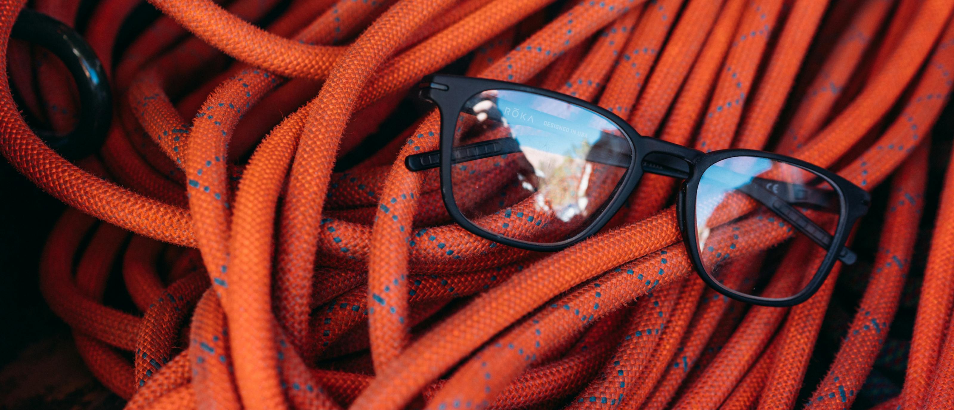 Rory eyeglasses and climbing rope