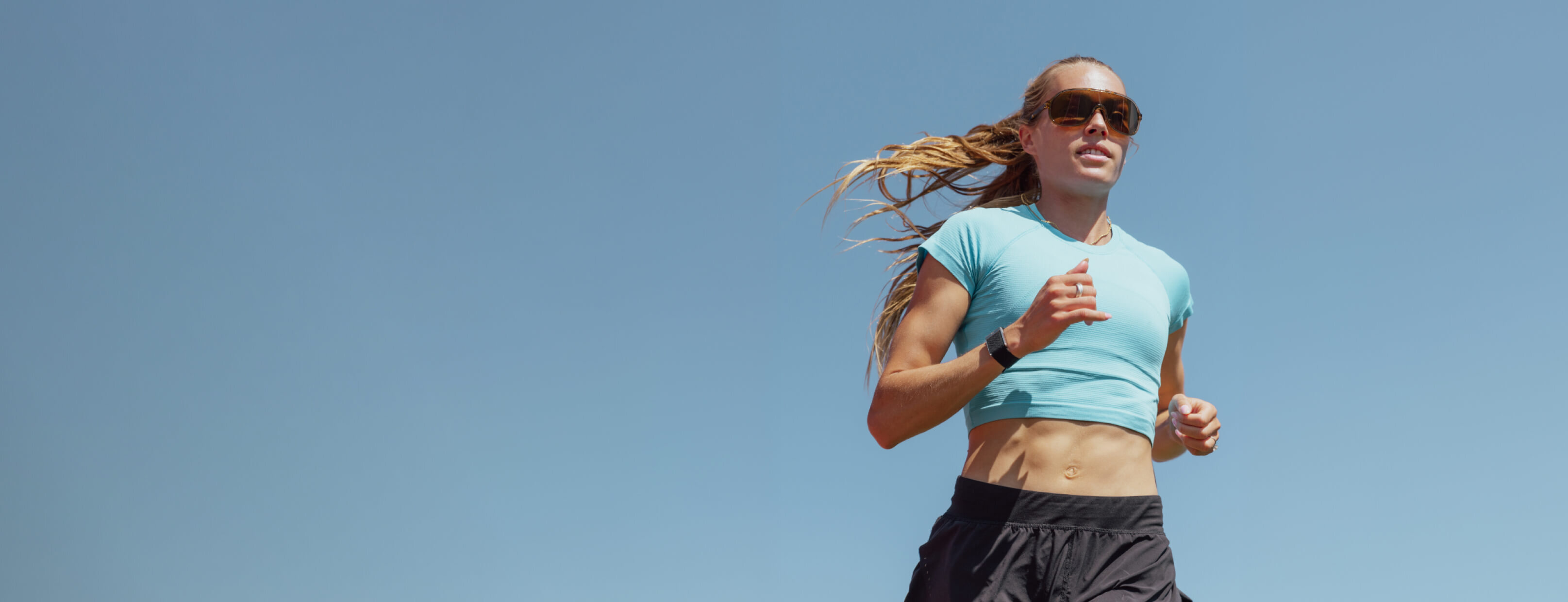 Colleen Quigley running in ROKA sunglasses