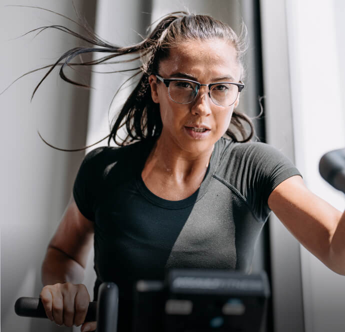 Woman on workout bike