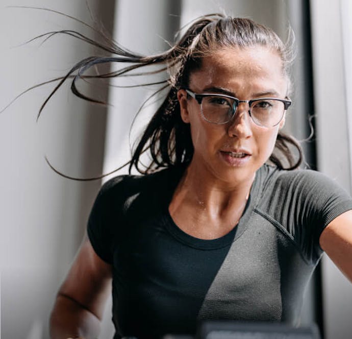 Woman on workout bike