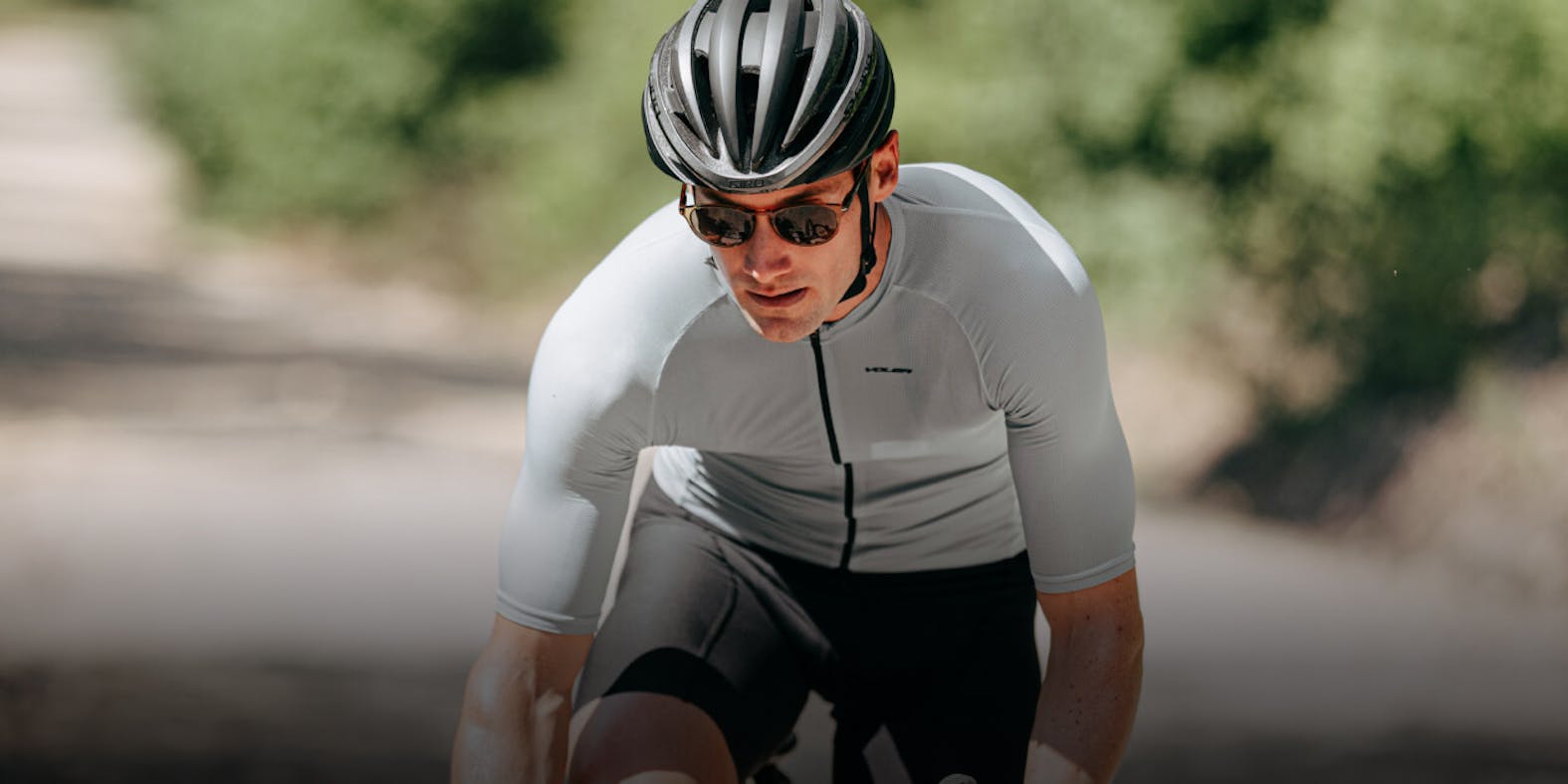 Man wearing tri top and ROKA sunglasses