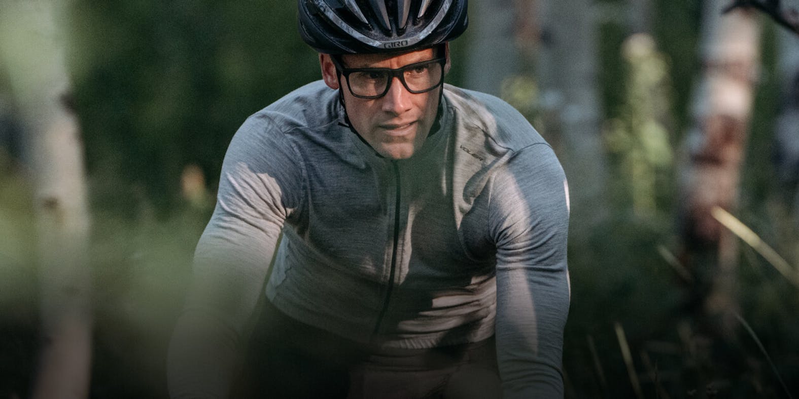 Man cycling in ROKA eyeglasses