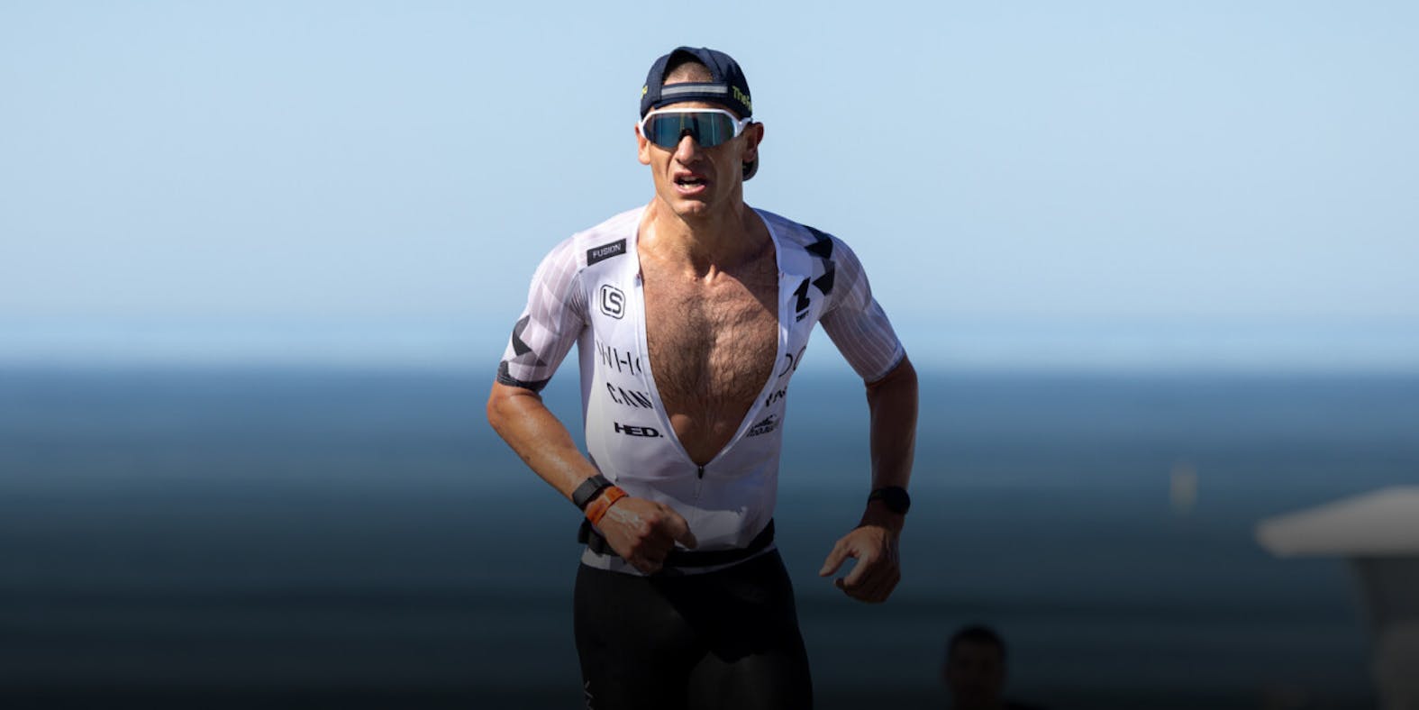 Man running un front of ocean