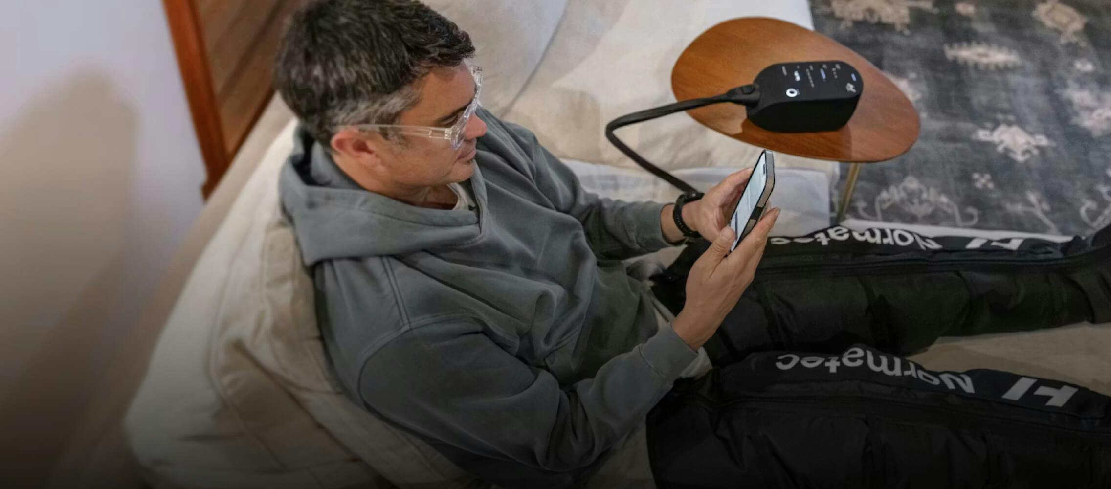 Man sitting looking at phone