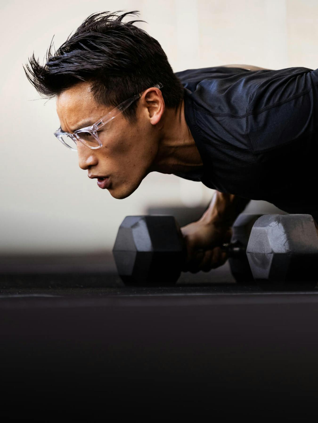 Man doing push up with dumbells
