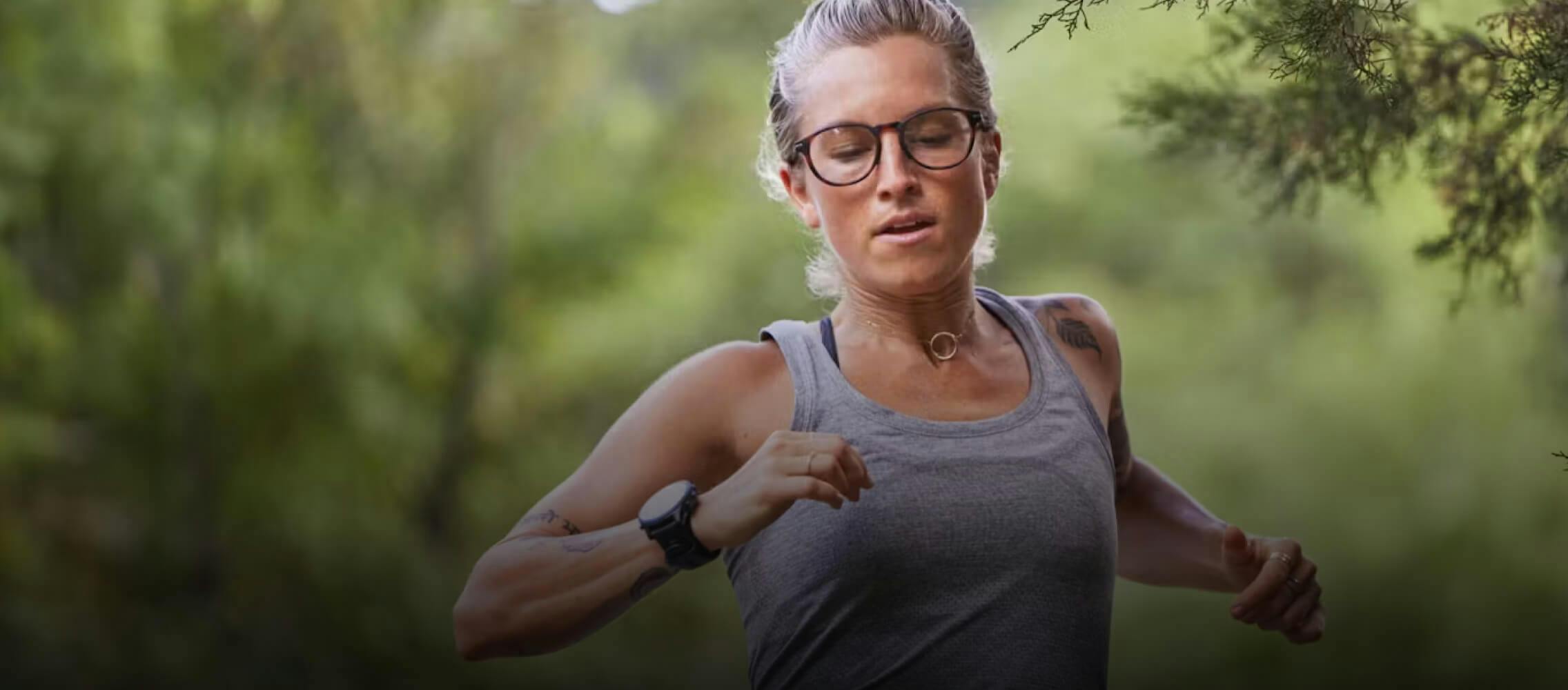 Woman jogging in woods