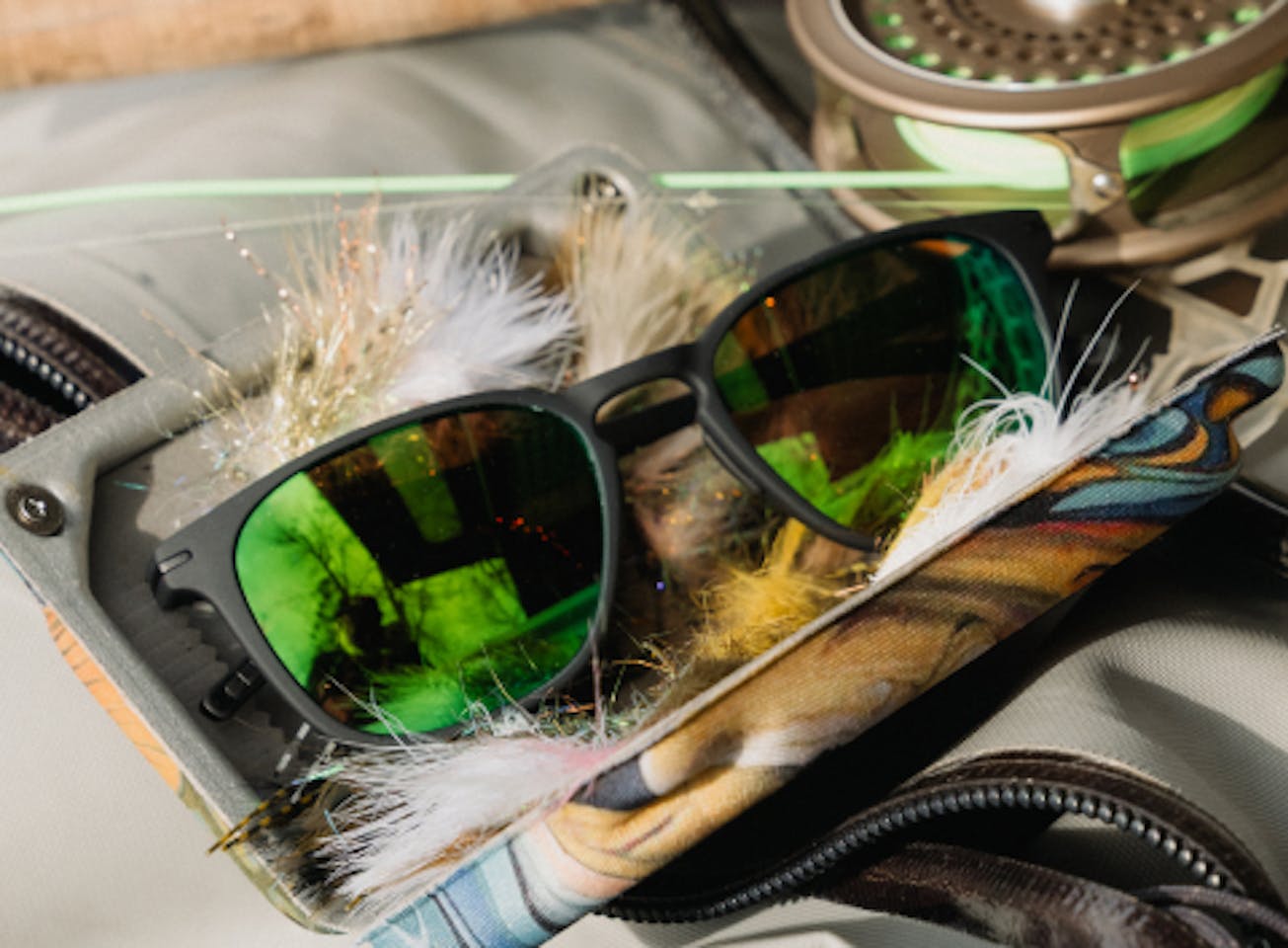 Green mirrored ROKA sunglasses