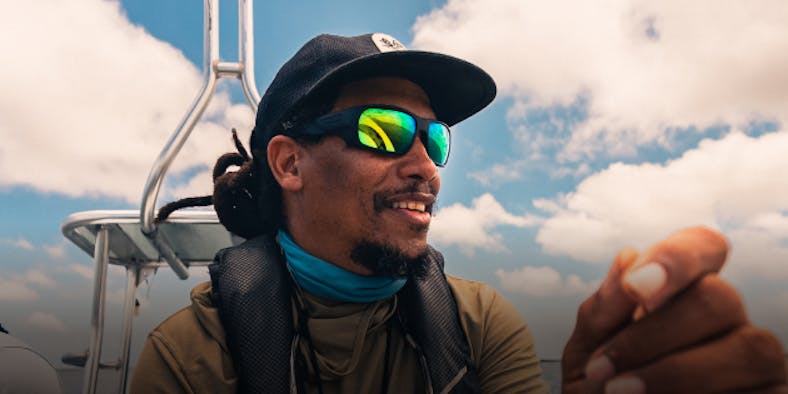 Man in green mirrored ROKA sunglasses