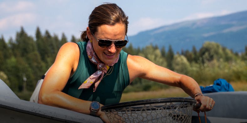 Woman on water wearing ROKA sunglasses