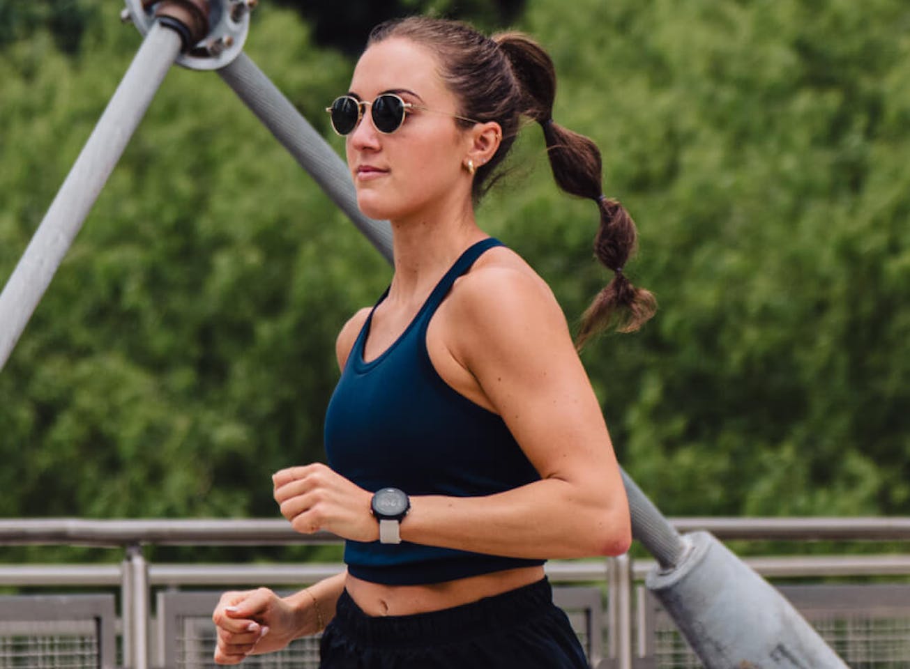 woman jogging in blue tank top and Alto Sunglasses