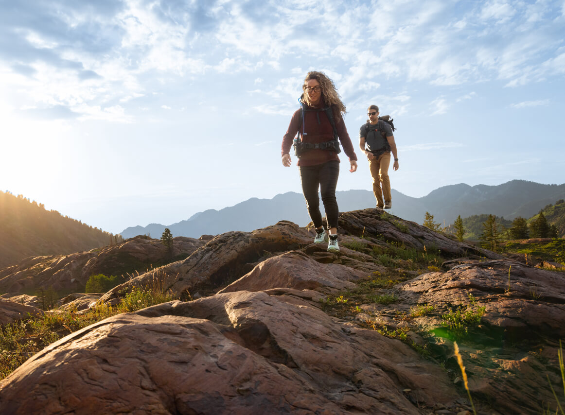 Woman and man hiking wearing Braker eyeglasses