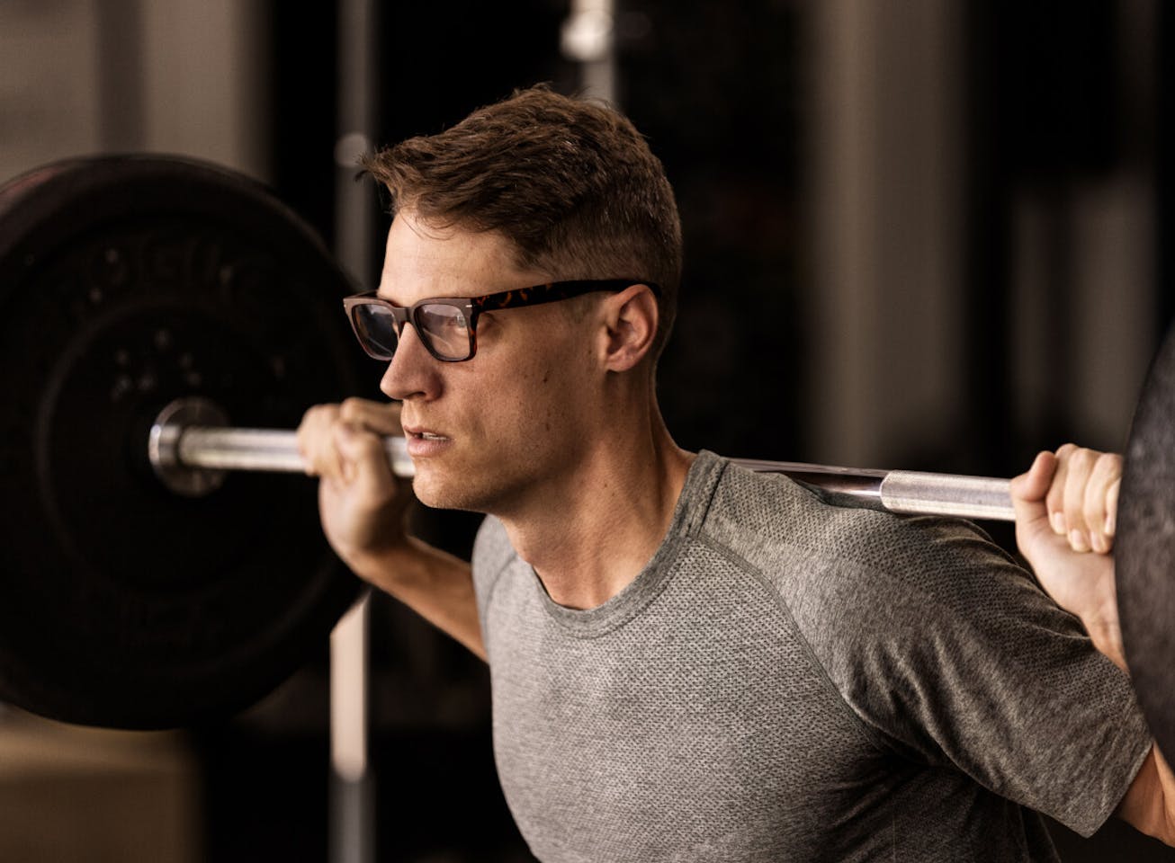 Man squatting in Lockhart eyeglasses