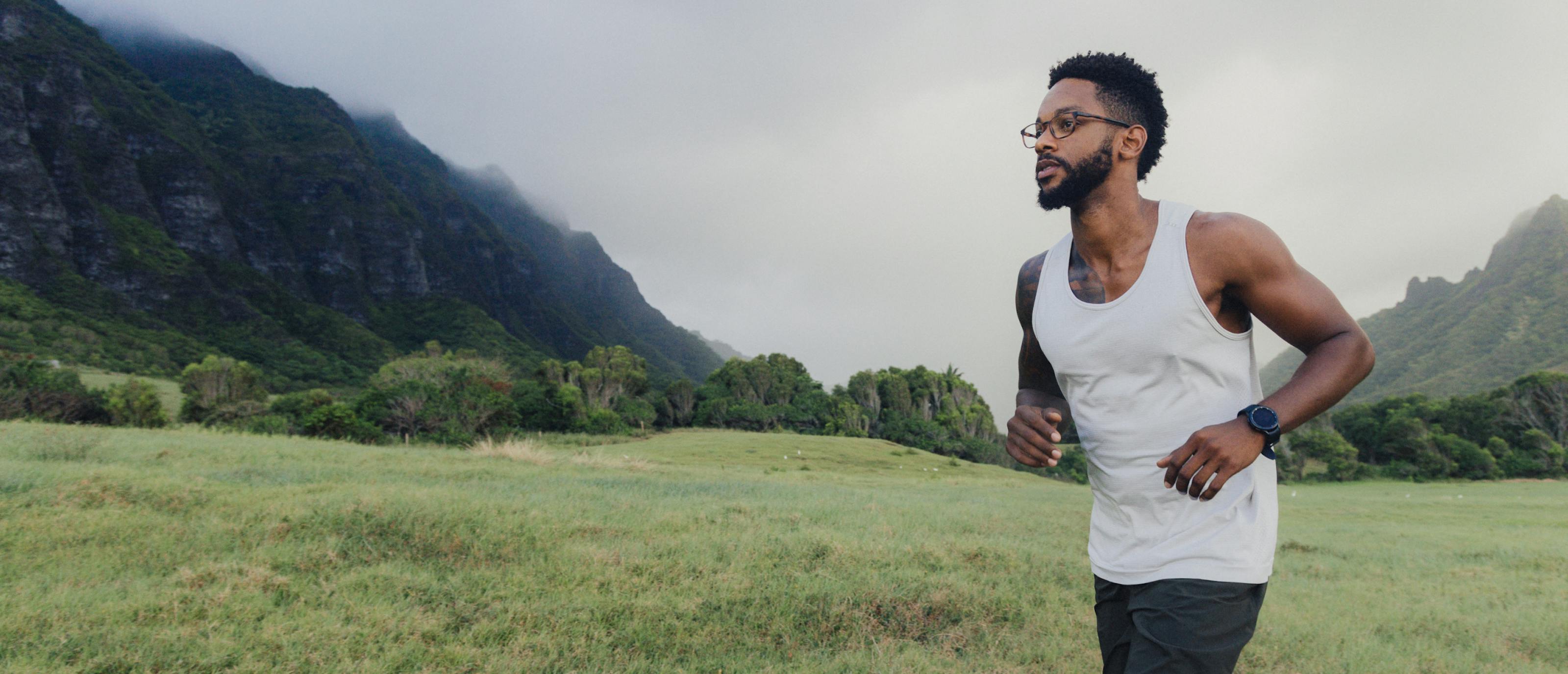 Man running wearing square, campfire tortoise Hunter eyeglasses