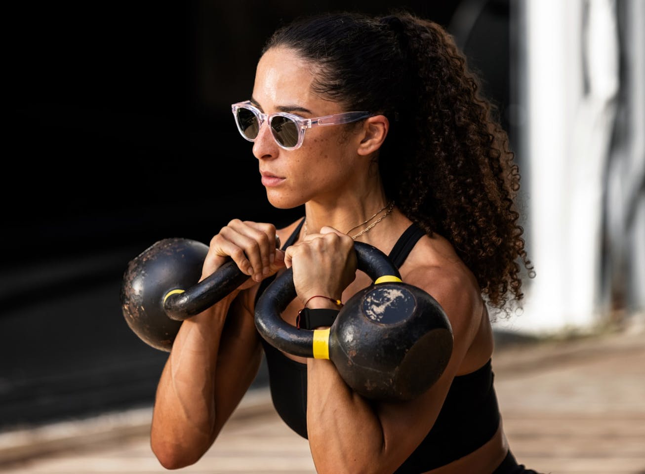 Woman workout out wearing Hamilton sunglasses