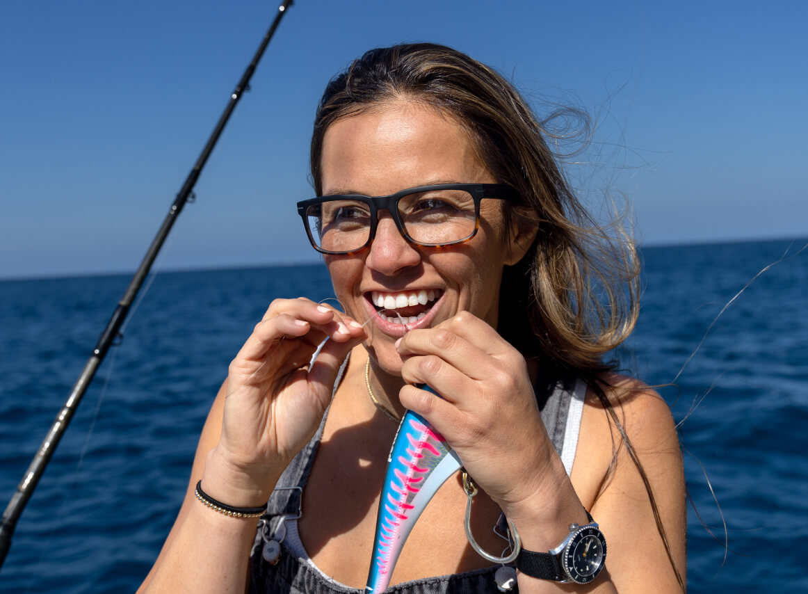 Woman smiling wearing Braker eyeglasses