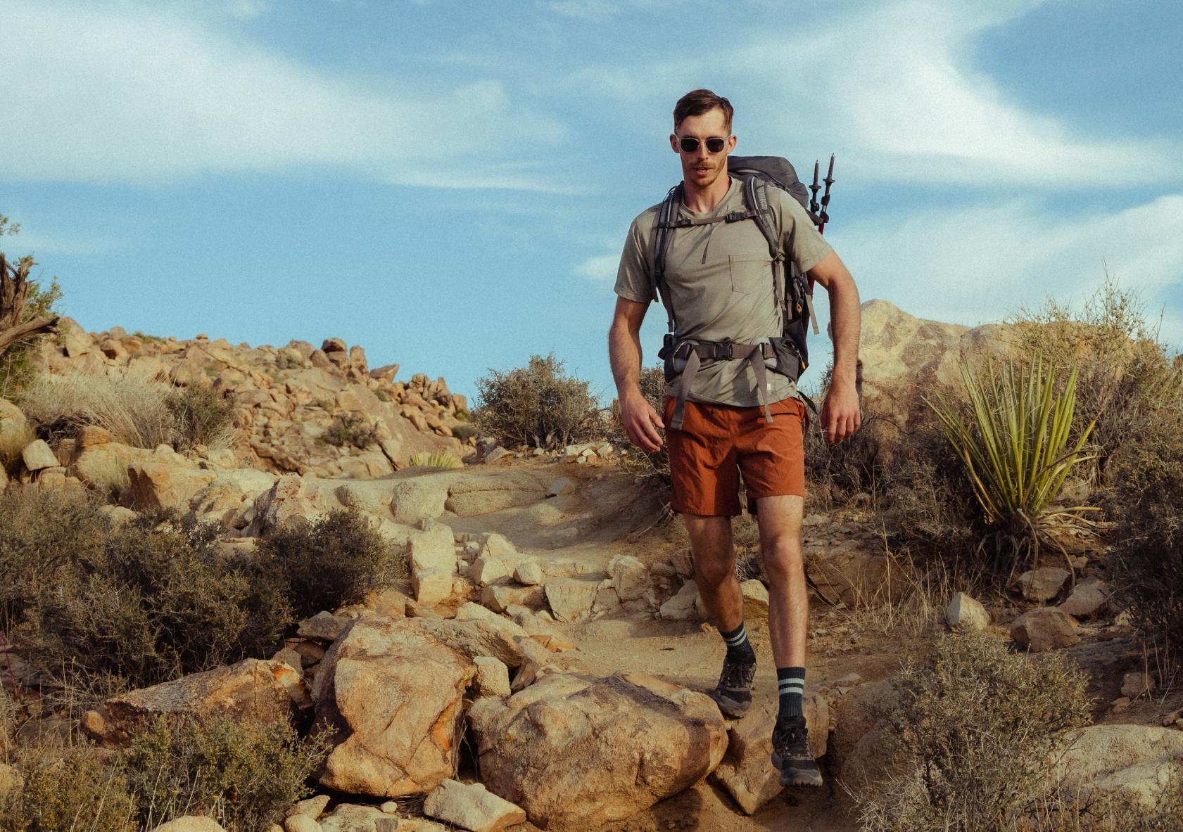Man hiking wearing Rory sunglasses