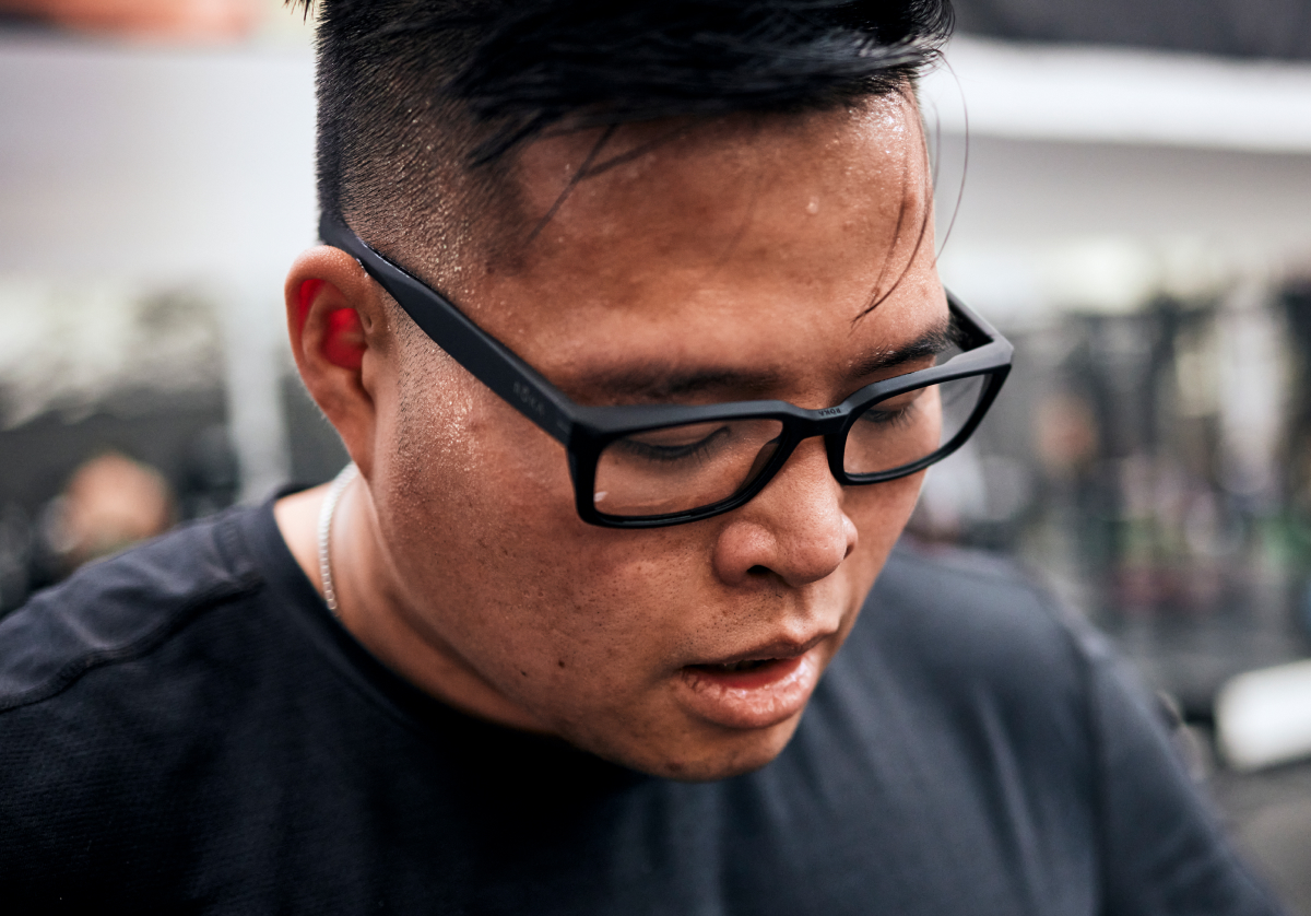 Man looking down wearing Mayfield eyeglasses