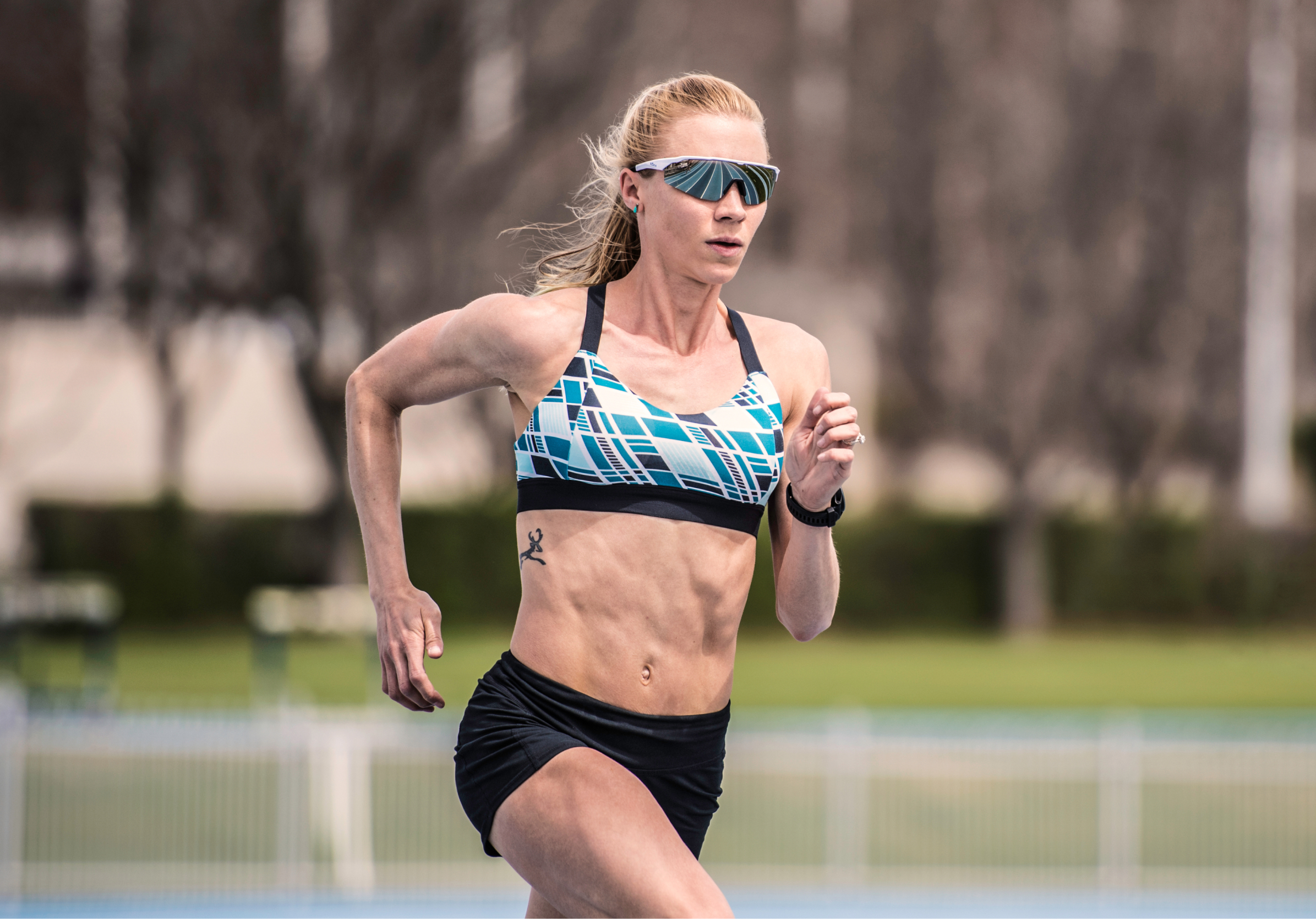 Woman running wearing SR-1X sunglasses
