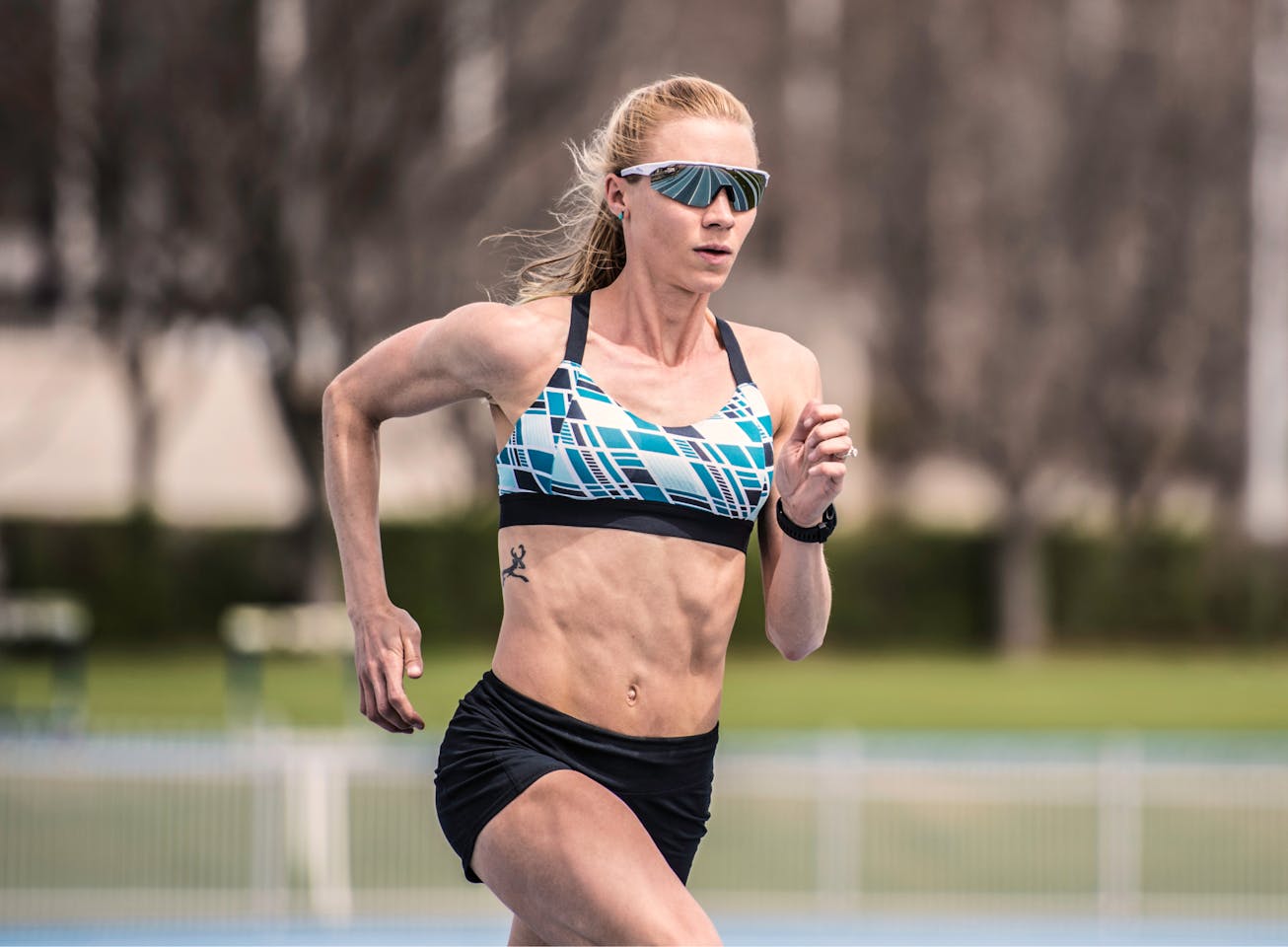 Woman running wearing SR-1X sunglasses