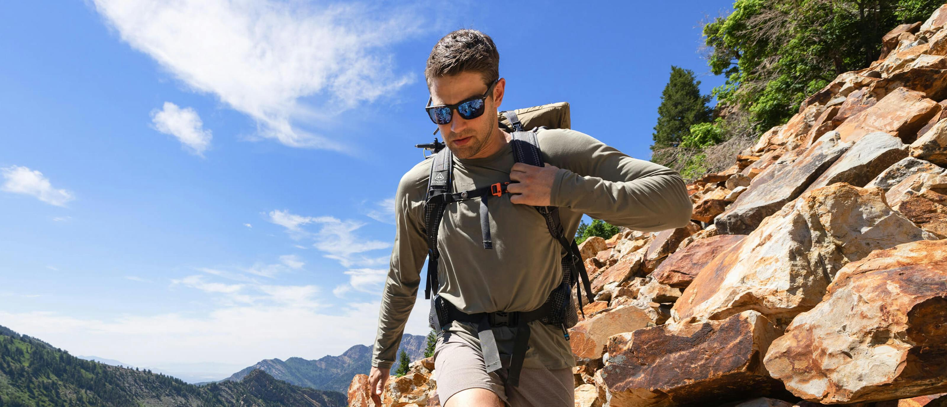 Hiker wearing Barton sunglasses