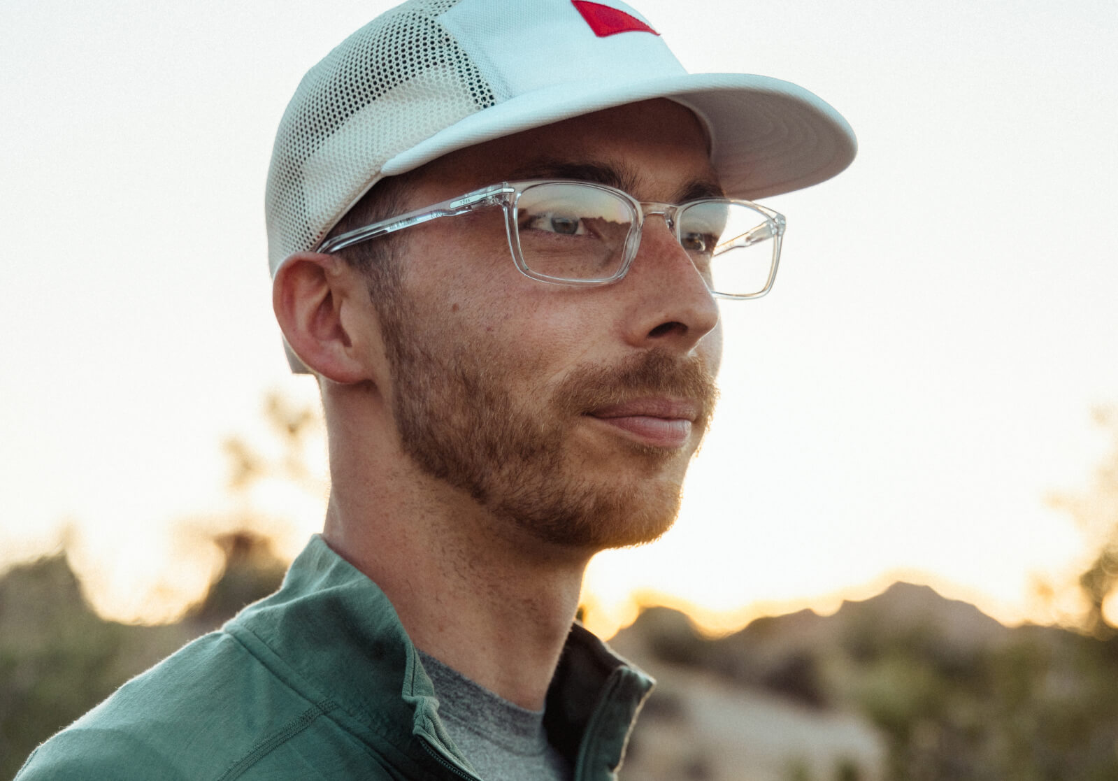 Man in white hat and Palmer eyeglasses